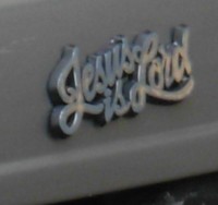 Jesus is Lord emblem on car of an FPA abortion employee