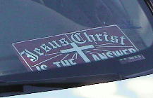 Jesus Christ is the Answer sign on car parked at the killing center