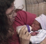 Terri Palmquist holds newborn baby Andrew before he was hospitalized.