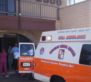 Victim of botched abortion is loaded into ambulance.